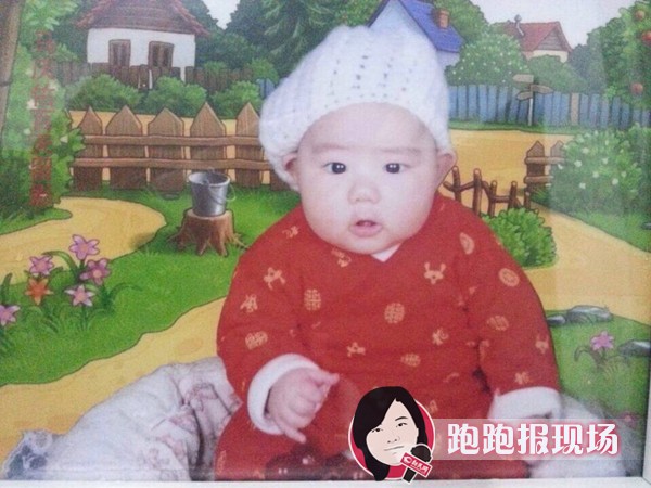 图说：失踪男婴的照片。新民网记者胡彦珣资料图src=